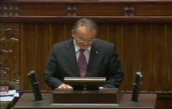 Zielony guzik z krzyżykiem
