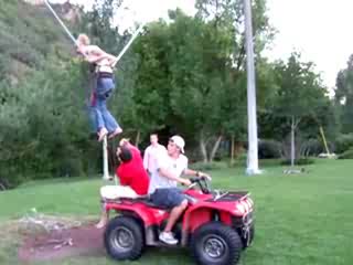 Girl In Human Slingshot